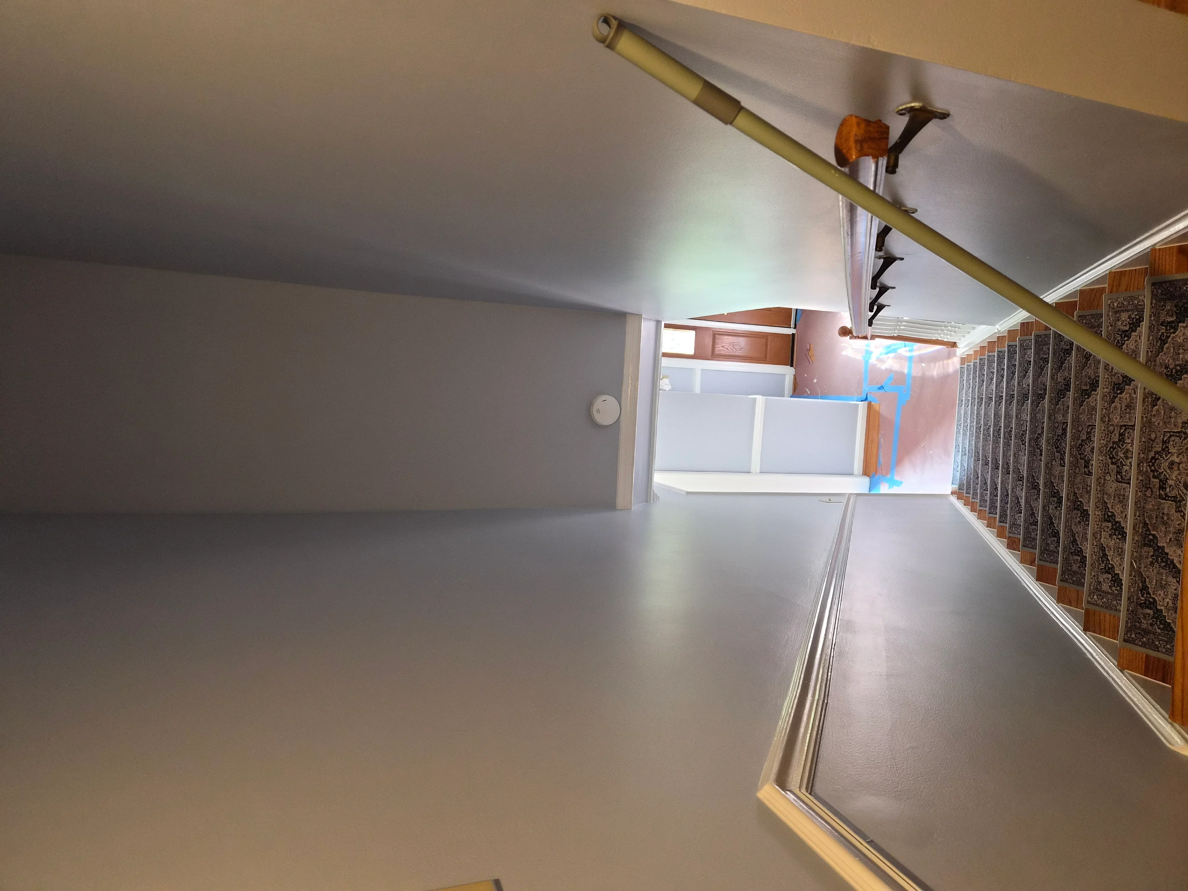 Finished drywall ceiling and walls with smooth paint-ready surface in residential interior