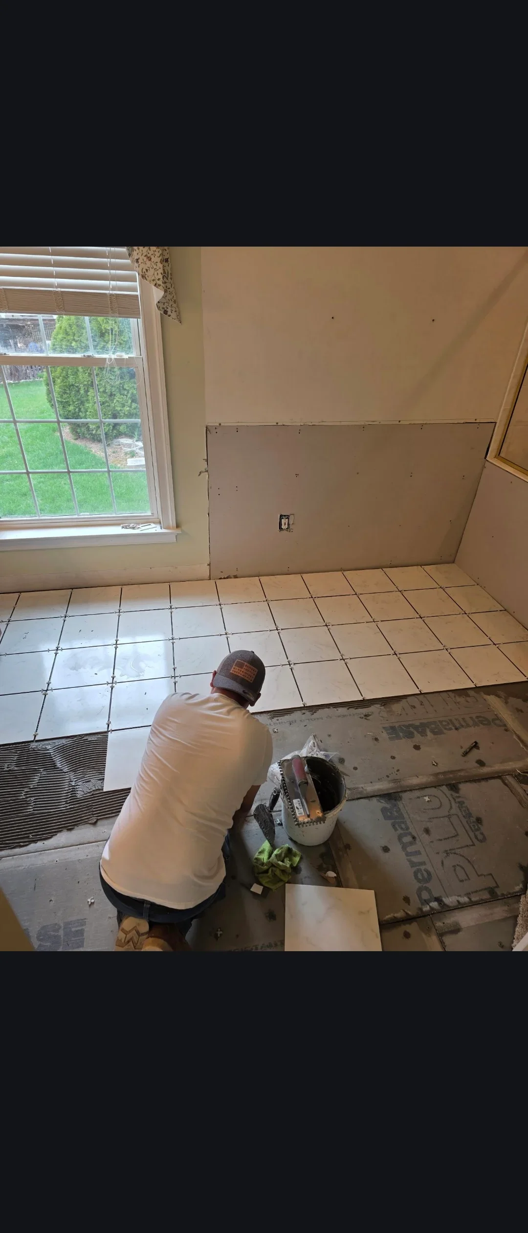 Drywall installation with taping and joint compound in residential interior room